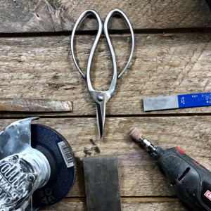 https://www.thecelticfarm.com/wp-content/uploads/2020/05/sharpening_garden_tools.jpg